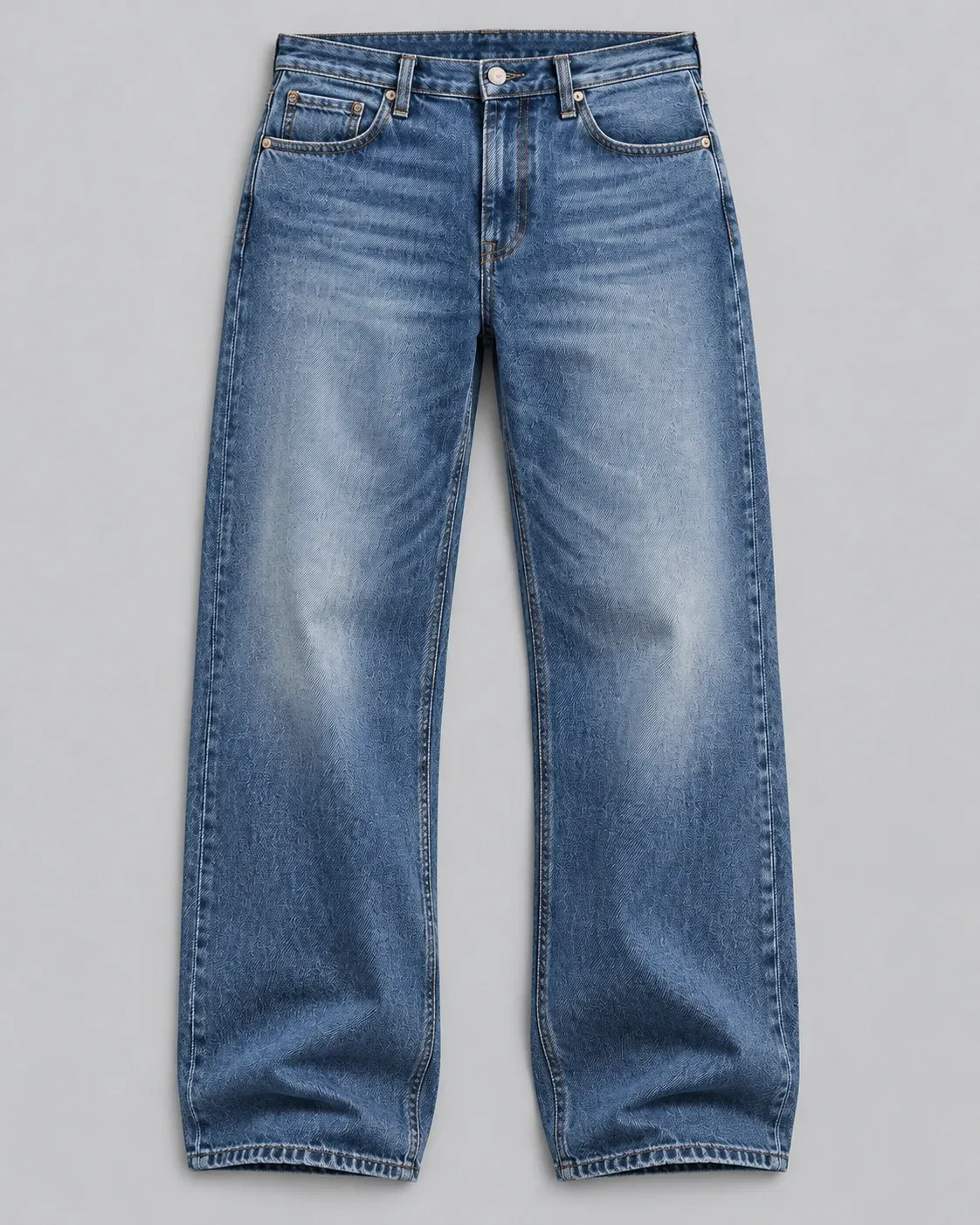 Blue washed straight-leg jeans laid flat