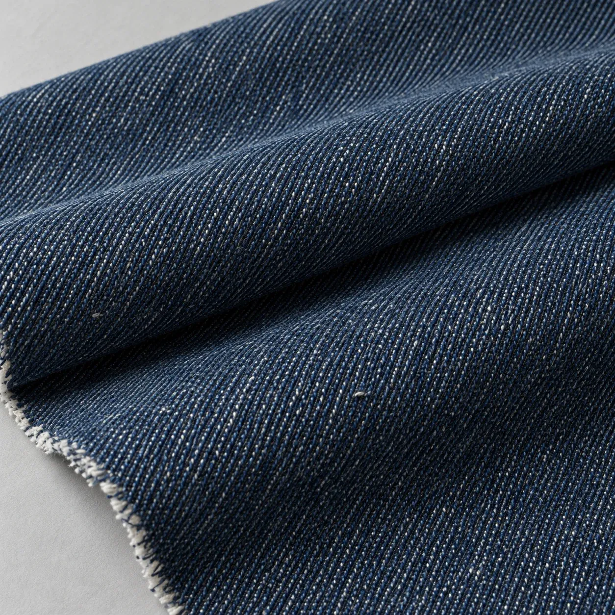 Close view of indigo denim with a visible twill line